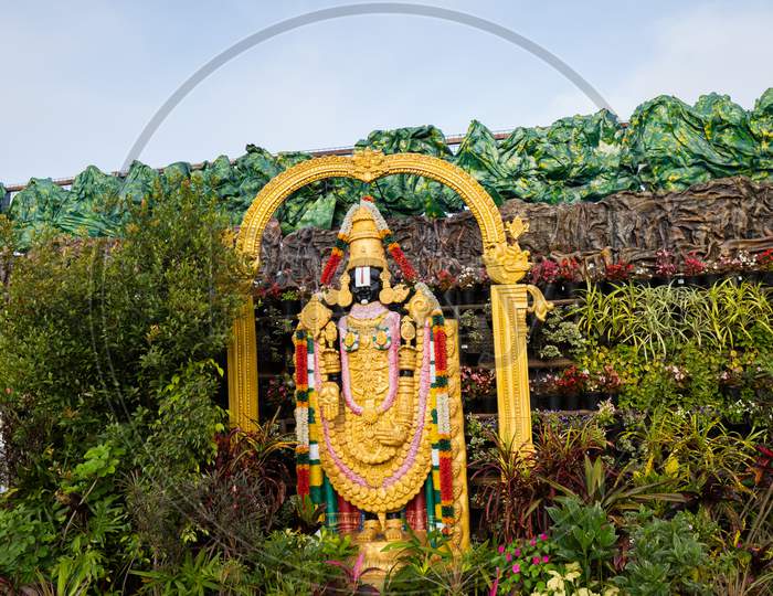 Lord Sri Venkateswara Swami statue in the Garden beside the road