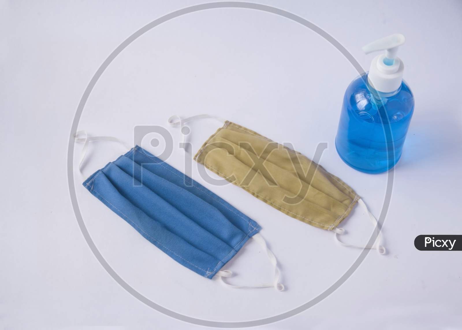 Pair of soft cotton layer mask with bottle of sanitiser