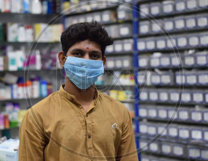Hyderabad, Telangana, India. June-29-2020: Shopkeeper Running His Business While Wearing A Mask, Corona Pandemic Concept, Medical Store