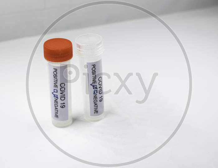 Testing For Presence Of Coronavirus. Tube Containing A Swab Sample That Has Tested Positive For Covid-19.