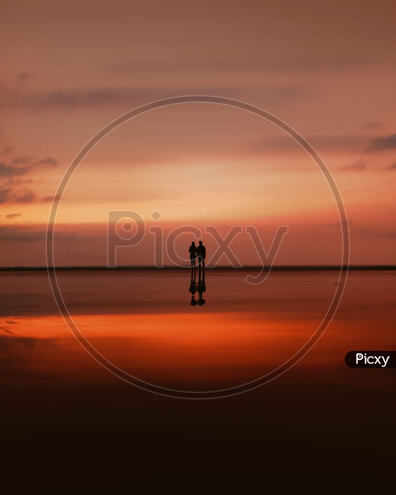 A couple during sunset
