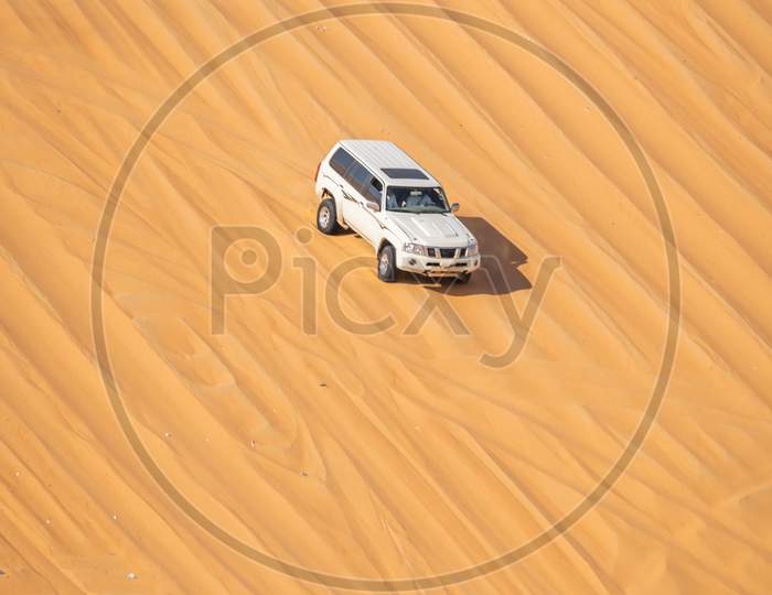 The Desert Patrol Vehicle Called Called The Fast Attack Vehicle Racing In Liwa Desert, Abu Dhabi,