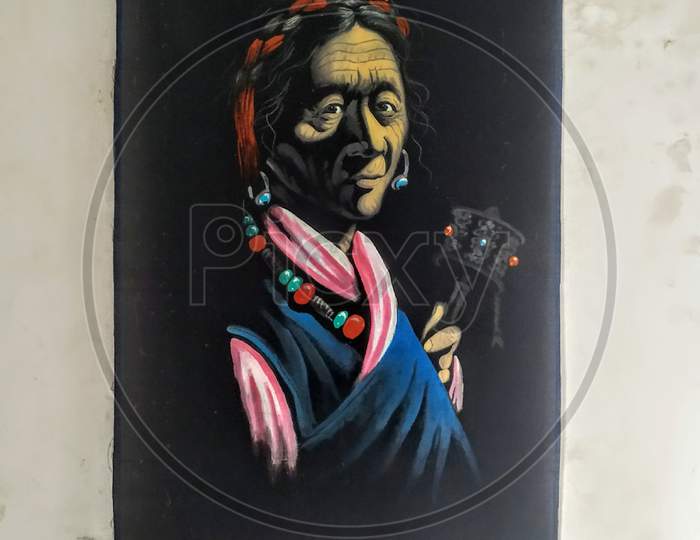Old Lady Painting Hanging On Wall