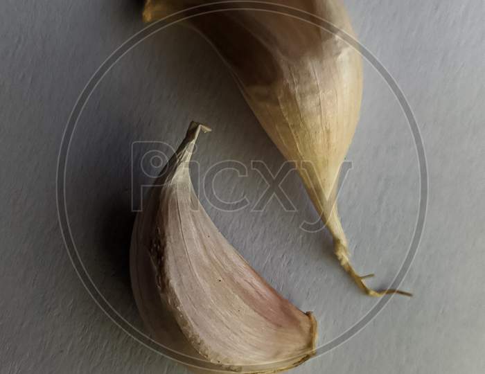 Garlic cloves in white background stock photo
