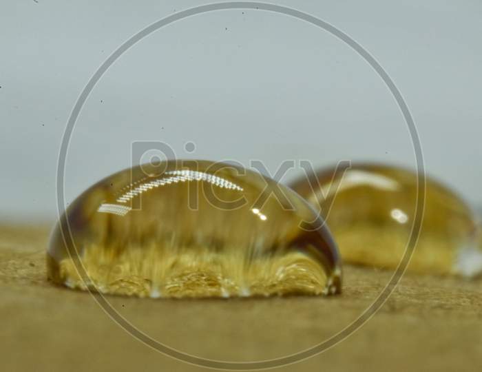 A Beautiful Closeup Photograph Of Water Drops.