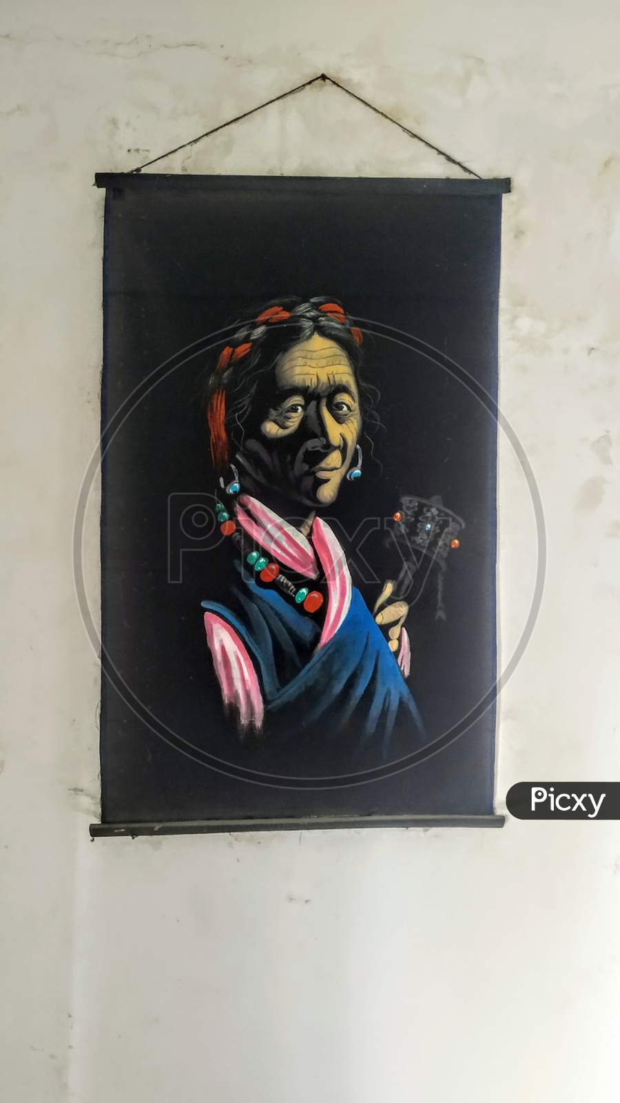 Old Lady Painting Hanging On Wall