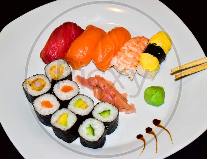 A Plate Of Selected Maki And Nigiri Sushi