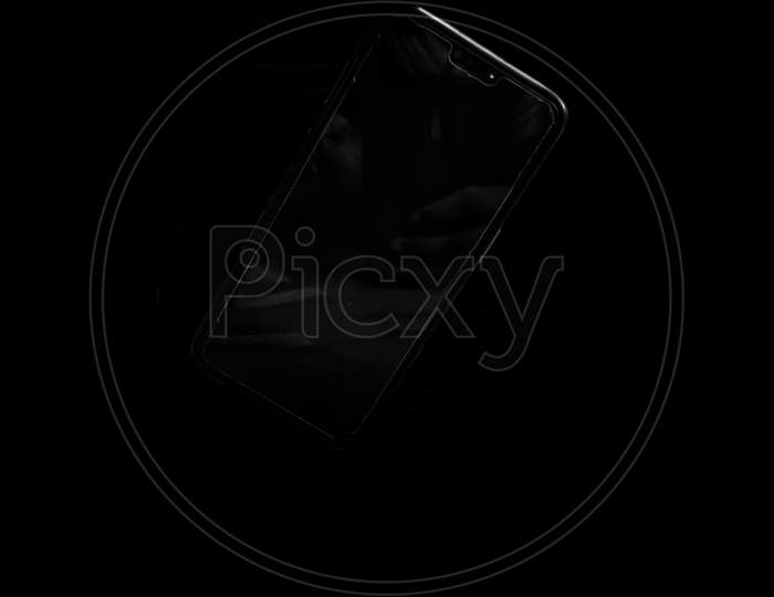 Dark portrait of a mobile phone