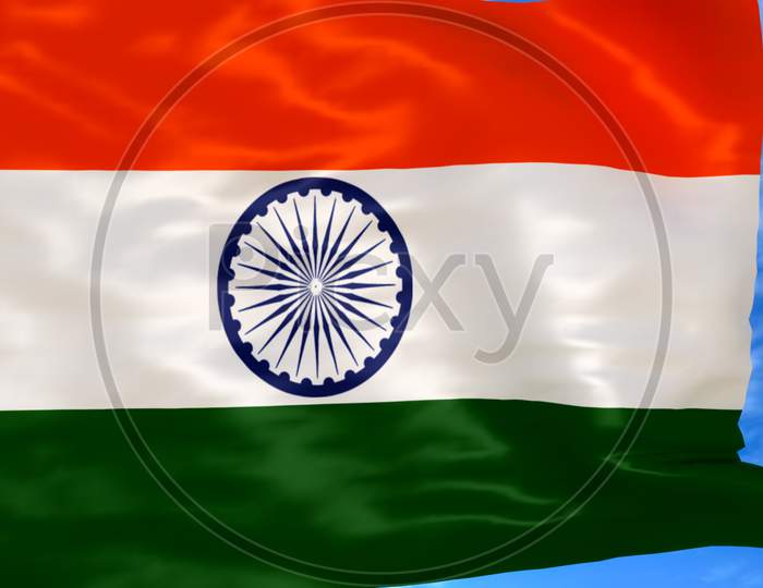 Indian national flag waving beneath blue sky on 15 august independence day / 2 january republic day
