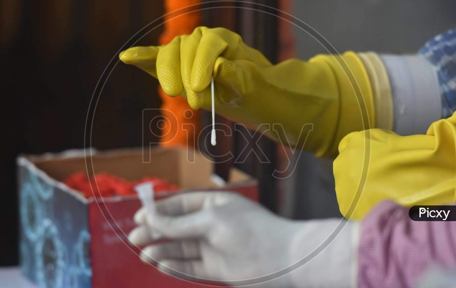 Patna, India - July 14: A Medical Worker Handles A Swab Sample Taken For Covid-19 Rapid Testing At Gardiner Hospital On July 14, 2020 In Patna, India