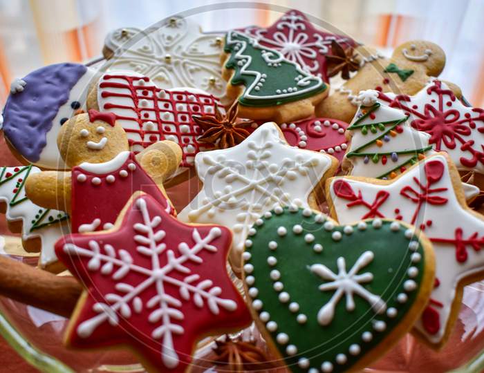 Traditionally Decorated Christmas Gingerbread Cookies On A Blass Bowl