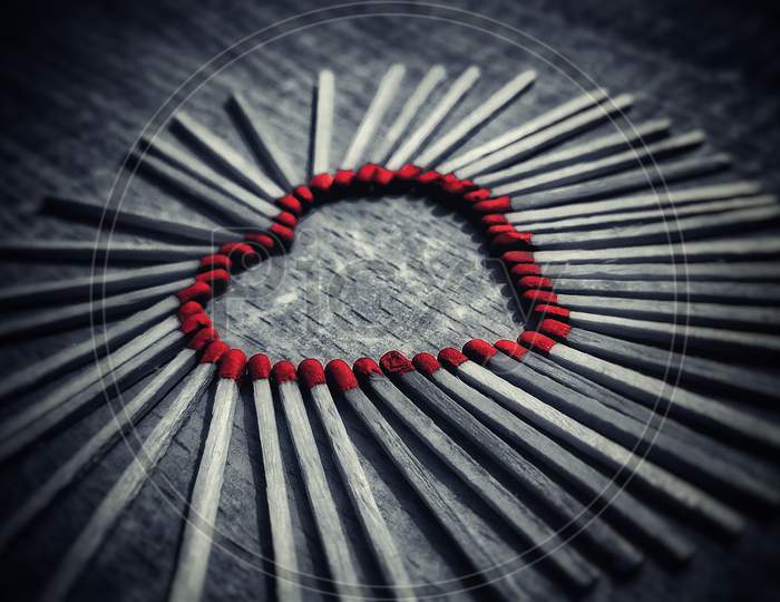 Red heart using matchsticks