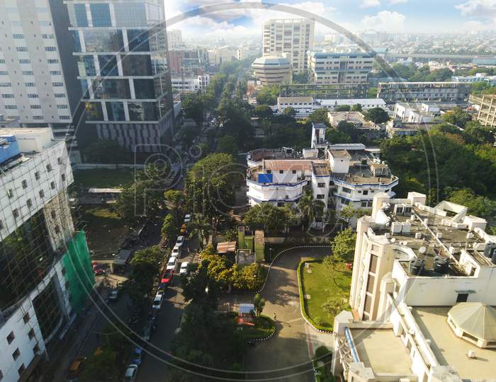 Sky view of a city area with random buildings from top