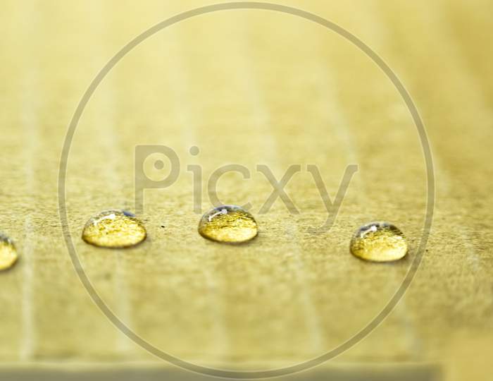 A Beautiful Closeup Photograph Of Water Drops.