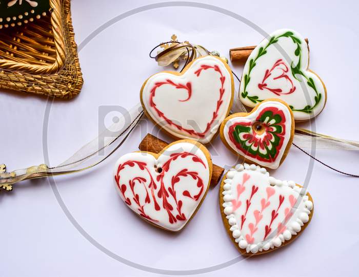Traditionally Decorated Heart Shaped Christmas Gingerbread Cookies Background