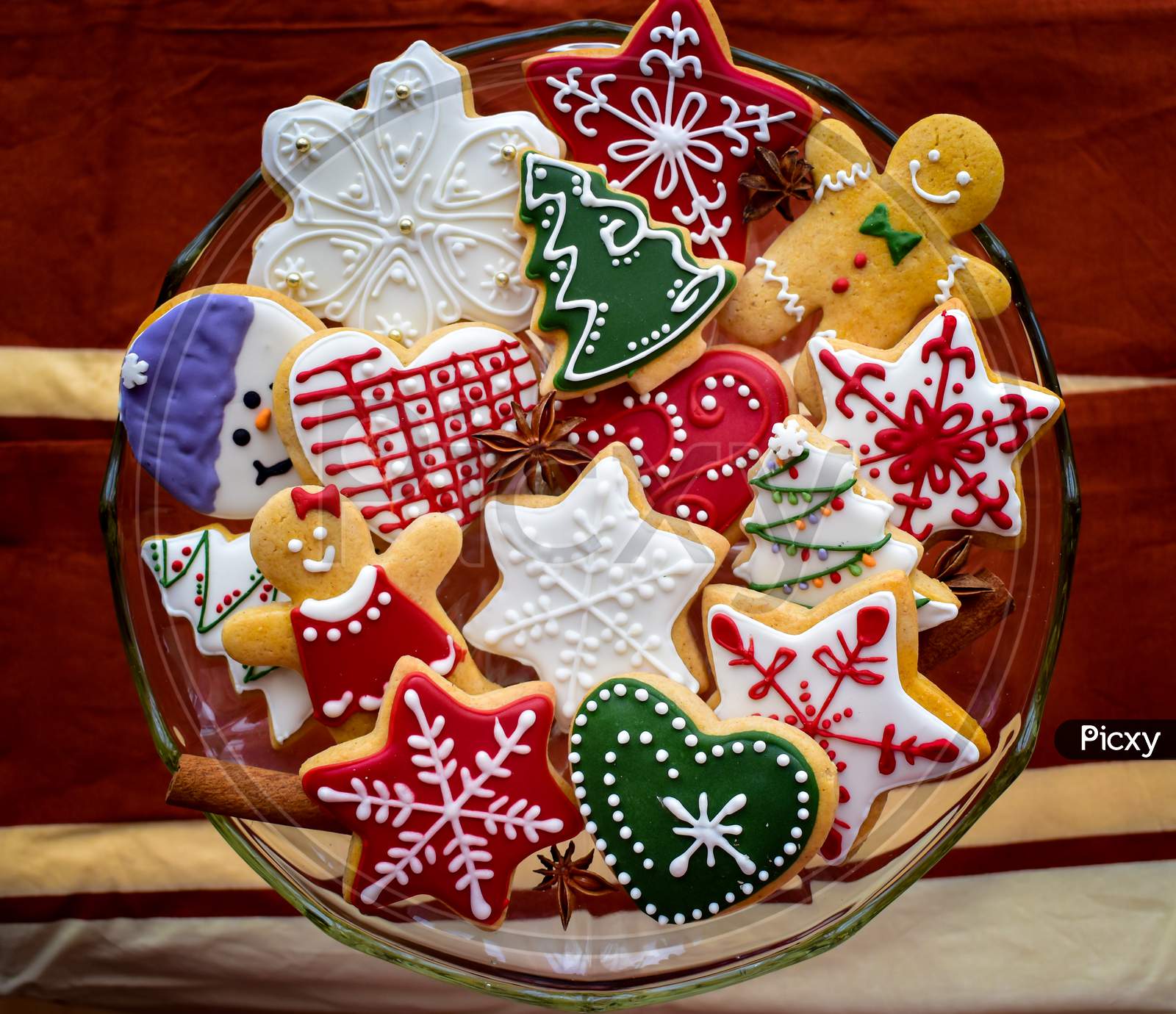 Traditionally Decorated Christmas Gingerbread Cookies On A Blass Bowl