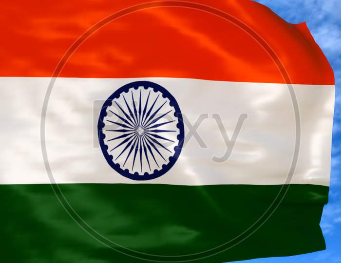Indian national flag waving beneath blue sky on 15 august independence day / 2 january republic day