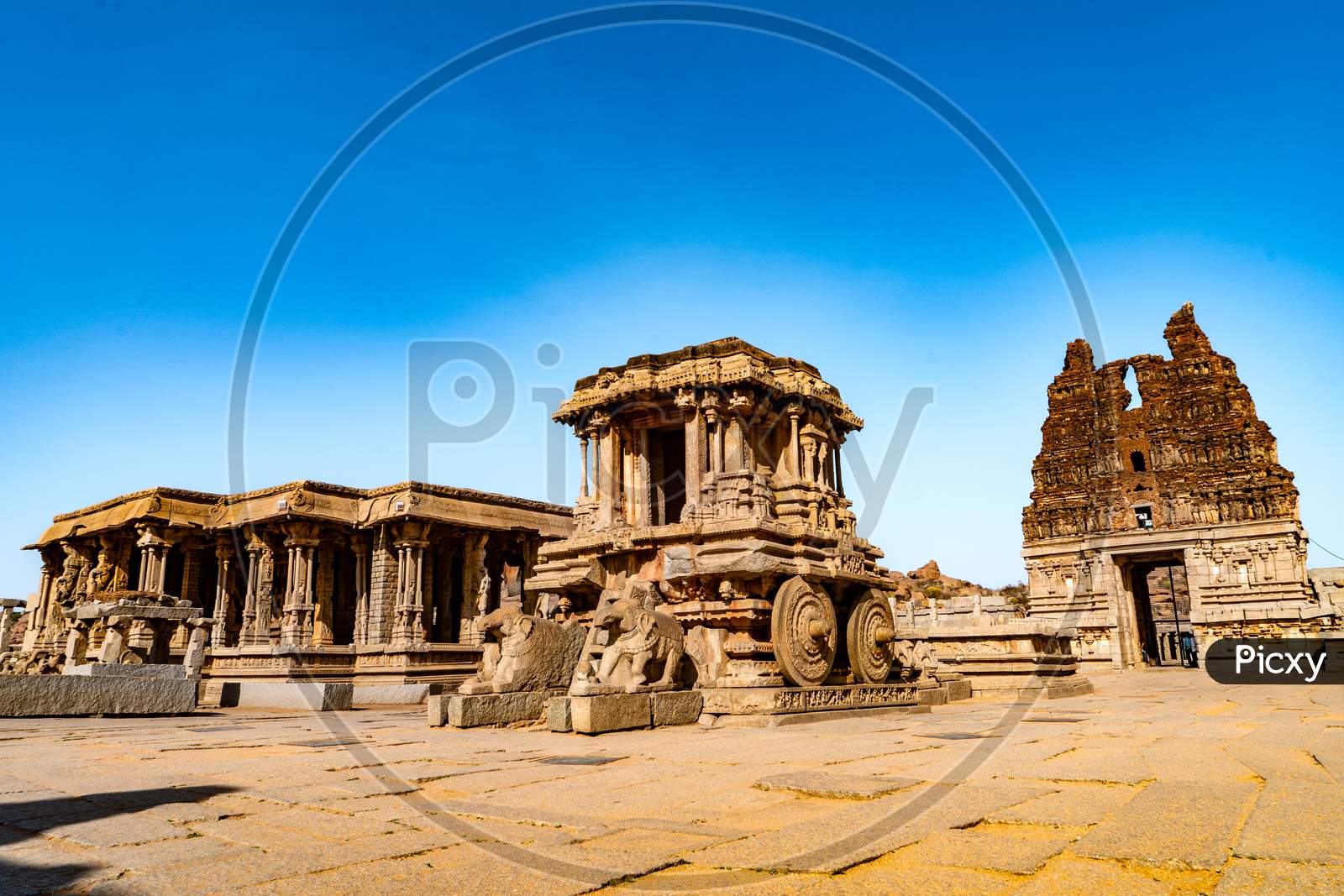 The Vitthala temple has a Garuda shrine in the form of a stone chariot in the courtyard; it is an often-pictured symbol of Hampi.