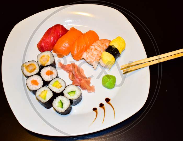 A Plate Of Selected Maki And Nigiri Sushi