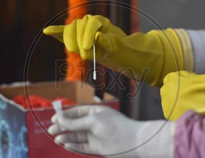 Patna, India - July 14: A Medical Worker Handles A Swab Sample Taken For Covid-19 Rapid Testing At Gardiner Hospital On July 14, 2020 In Patna, India