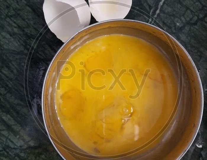 egg yolk in bowl health breakfast