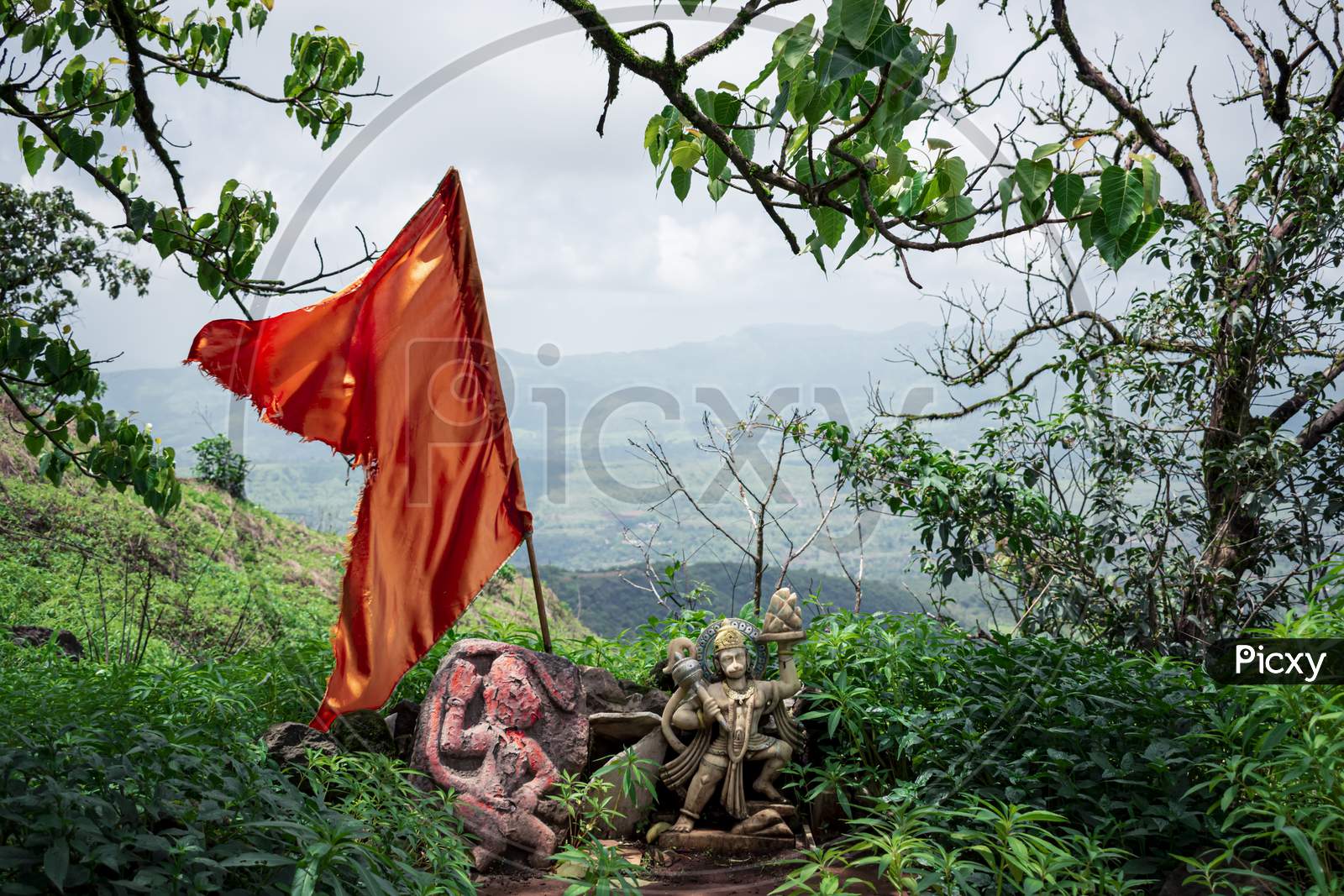 Hanuman idol with a saffron flag