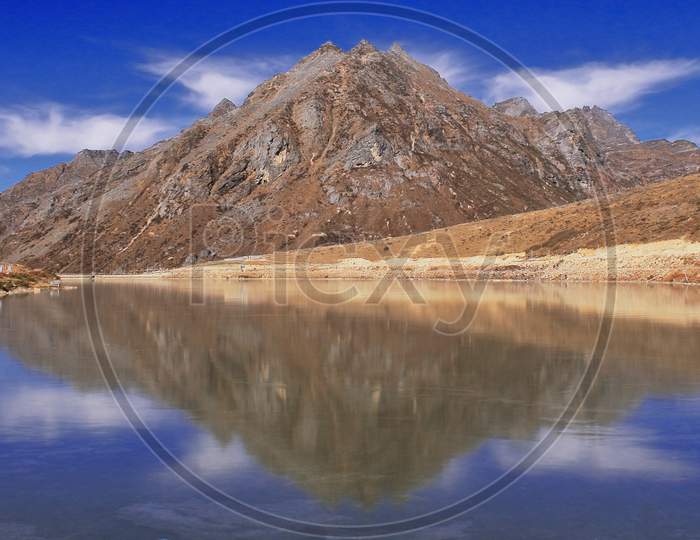alpine barren landscape and beautiful sela lake