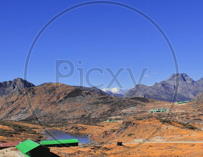 scenic landscape and snow capped himalayan peak near bum la pass
