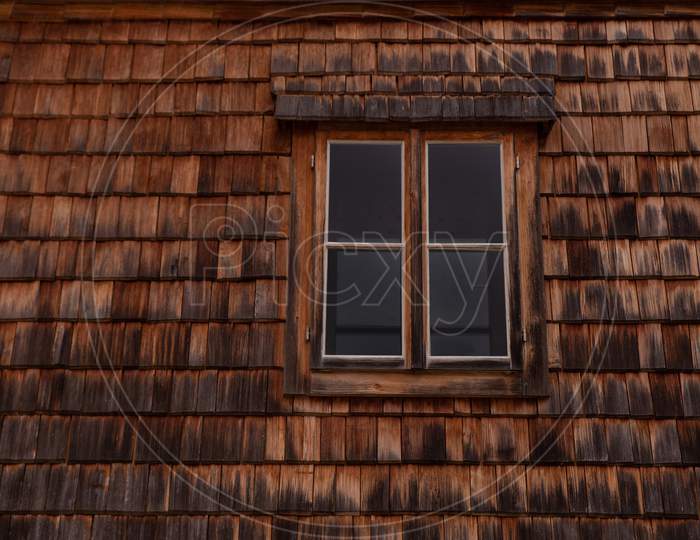 old wooden window with wooden shutters