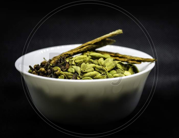 Isolated View Of Spices In A White Bowl With Black Background
