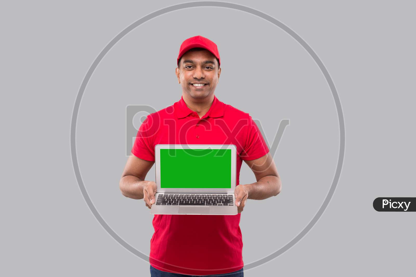 Delivery Man Showing Laptop Green Screen. Home Orders, Quarantine Delivery, Shopping Online, Freelance Worker Concept.
