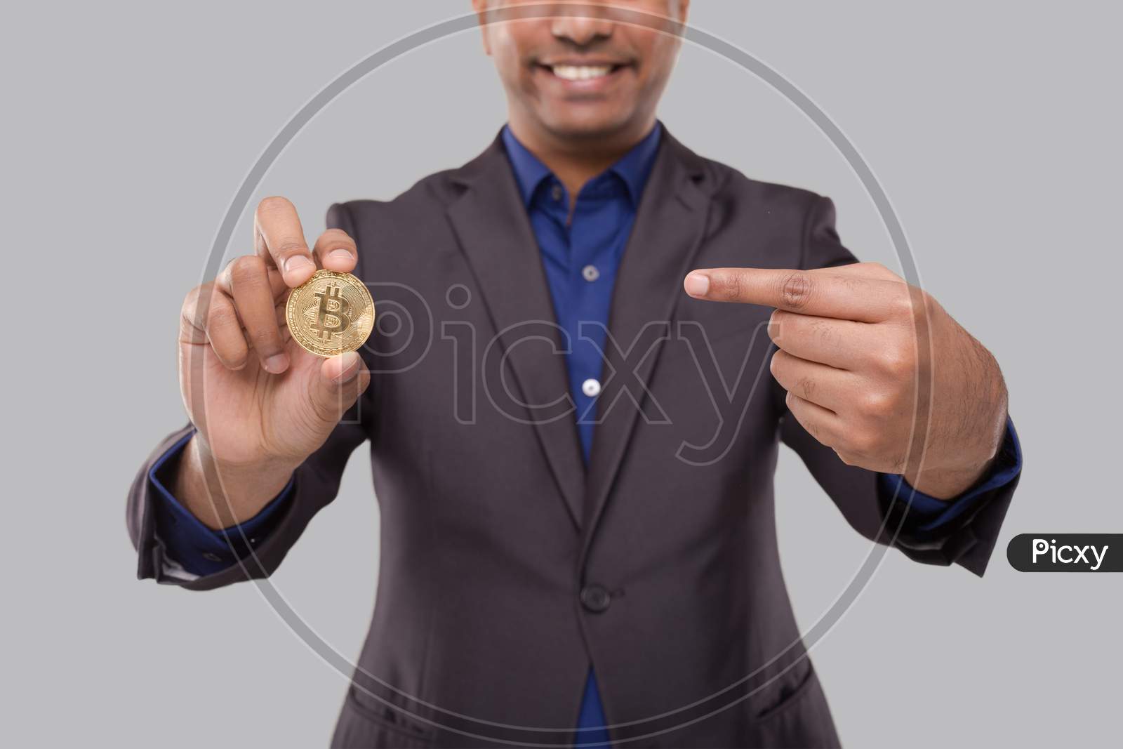 Businessman Pointing At Bitcoin. Business Man Cypto Currency.