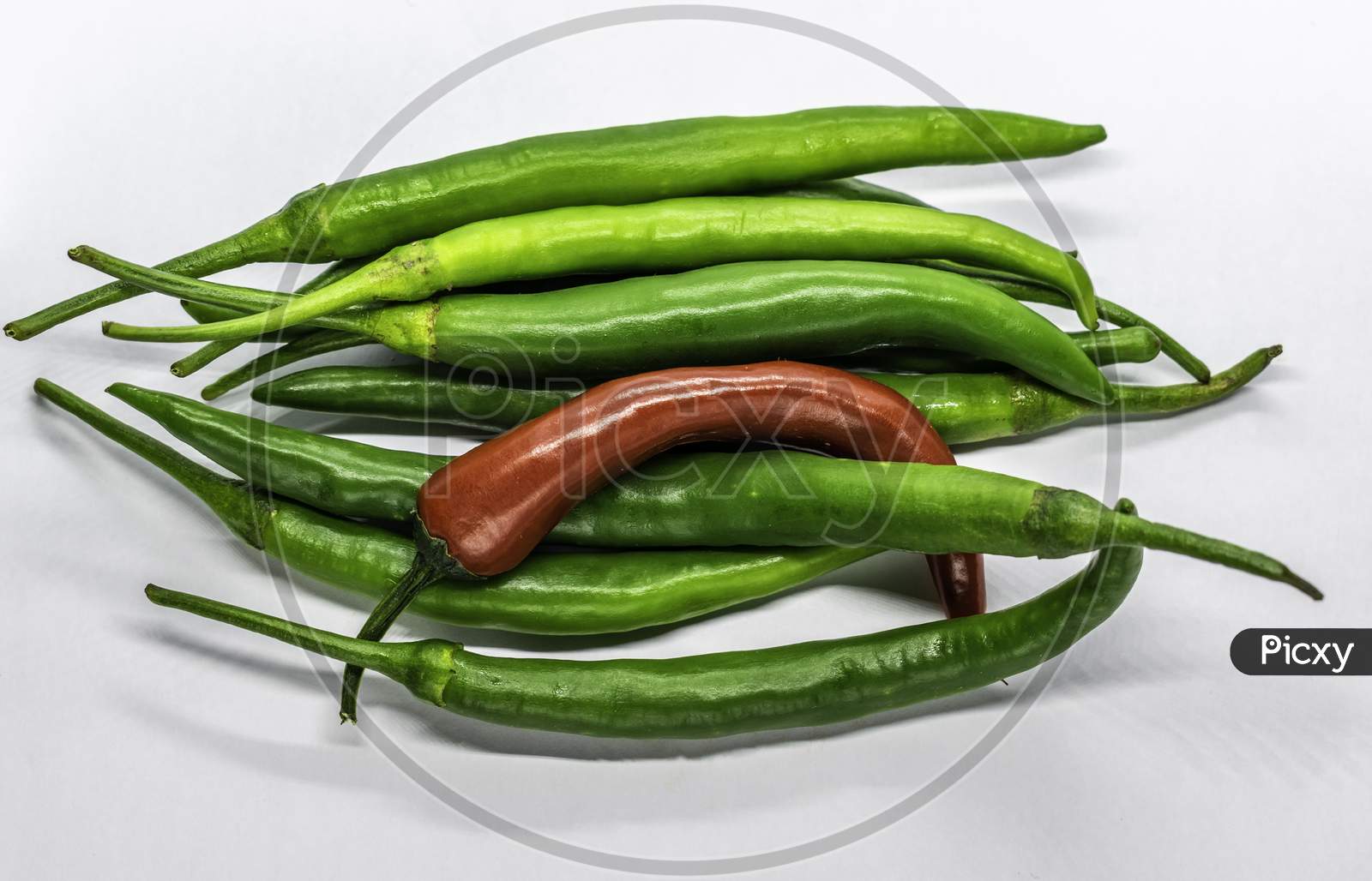 A Bunch Of Green And Red Chillies In White Background, Selective Focus, Selective Focus On Subject, Background Blur