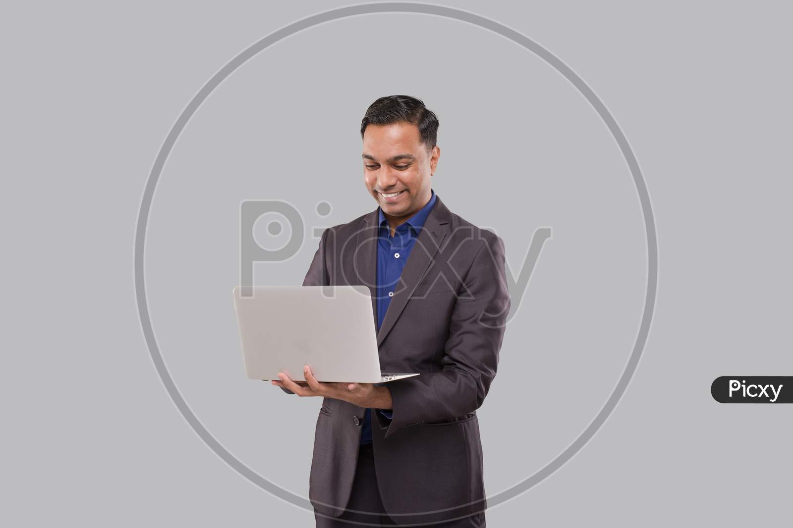 Businessman Using Laptop Green Screen Isolated. Indian Business Man With Laptop In Hands. Online Business Concept