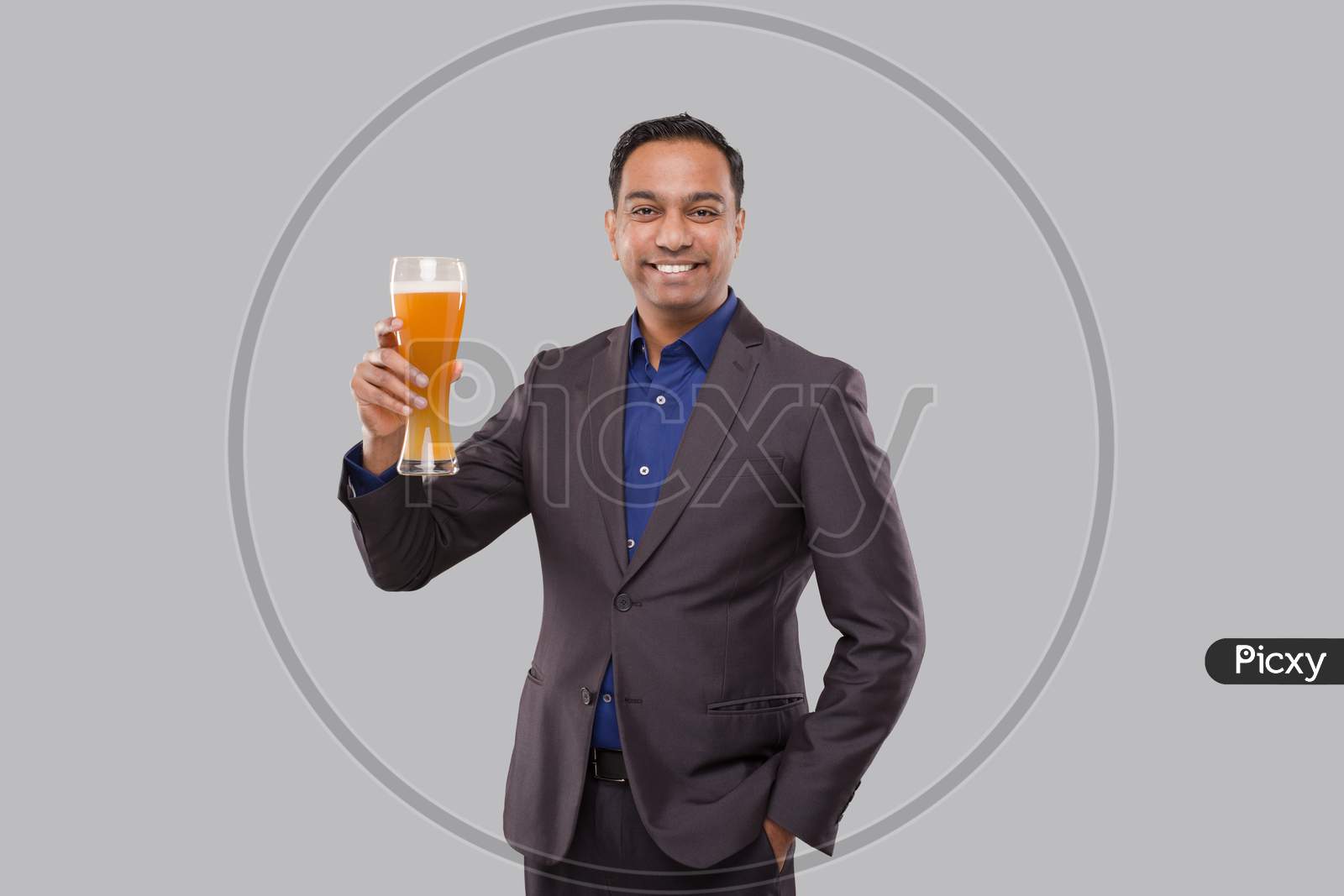 Businessman Showing Beer Glass. Indian Business Man Standing Full Length With Beer In Hand