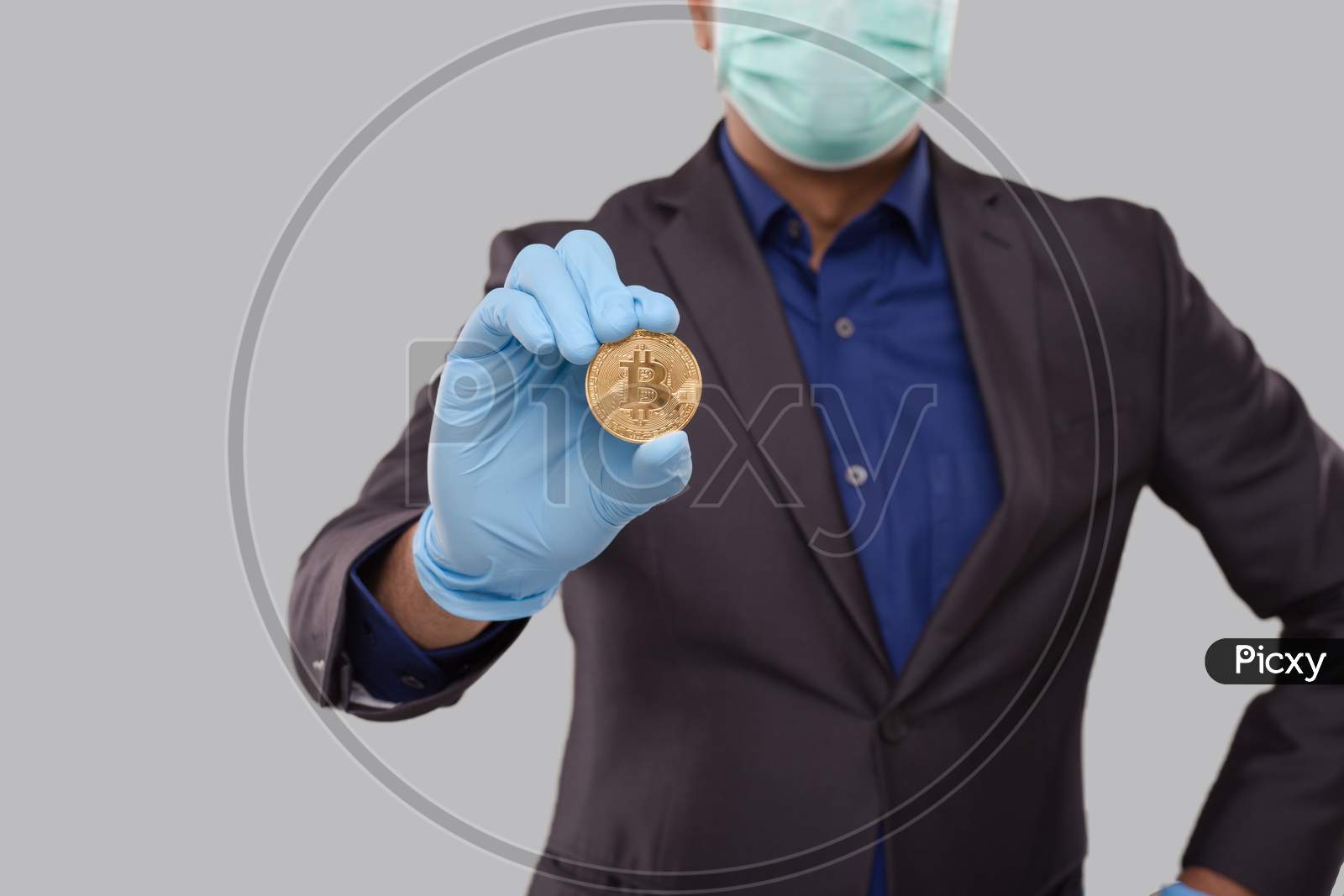 Businessman Showing Bitcoin Wearing Medical Mask And Gloves. Business Man Cypto Currency.