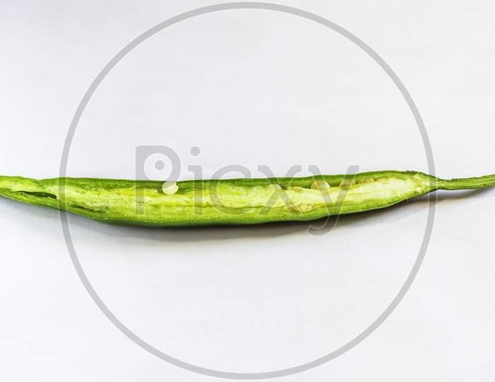 Cut Green Chili On A Nice White Backgound,  Selective Focus, Selective Focus On Subject, Background Blur