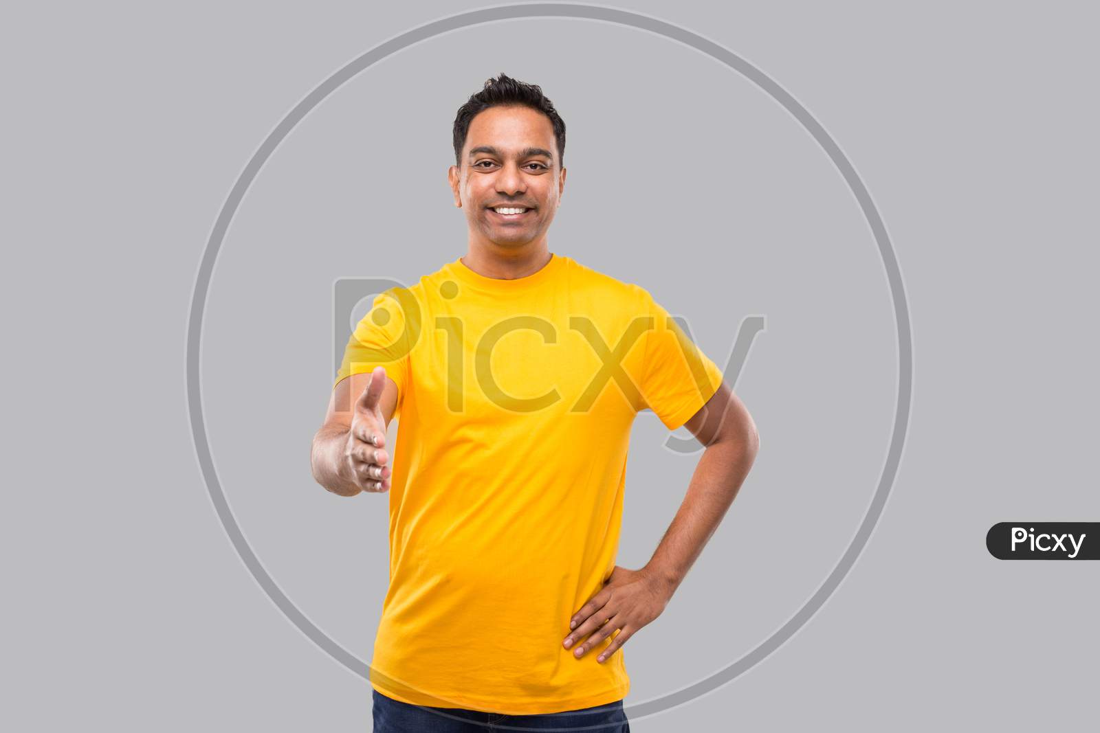 Indian Man Offering Hand To Shake. Greeting And Welcoming Gesture. Business Advertisement Concept. Hand Shake