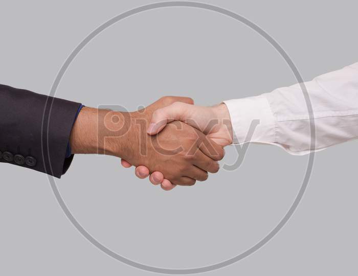 Hand Shake White And Black Businessmen. International Friendship Hand Shake. Black Lives Matter