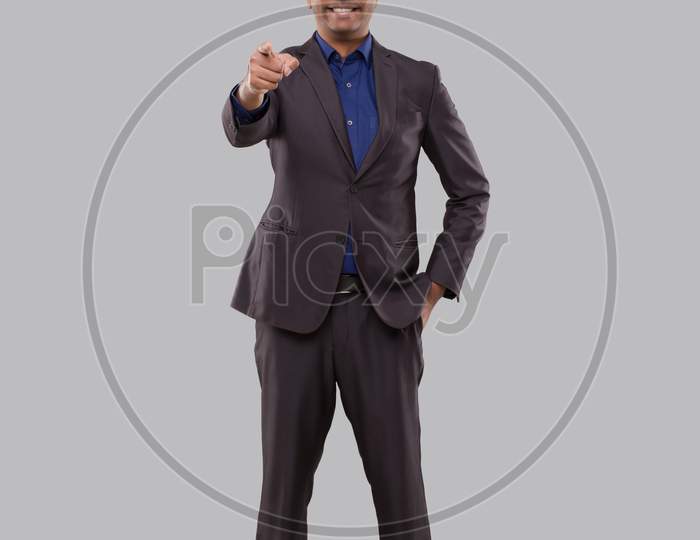 Businessman Pointing Front Watching In Camera Isolated. Indian Man Standing Full Lenght