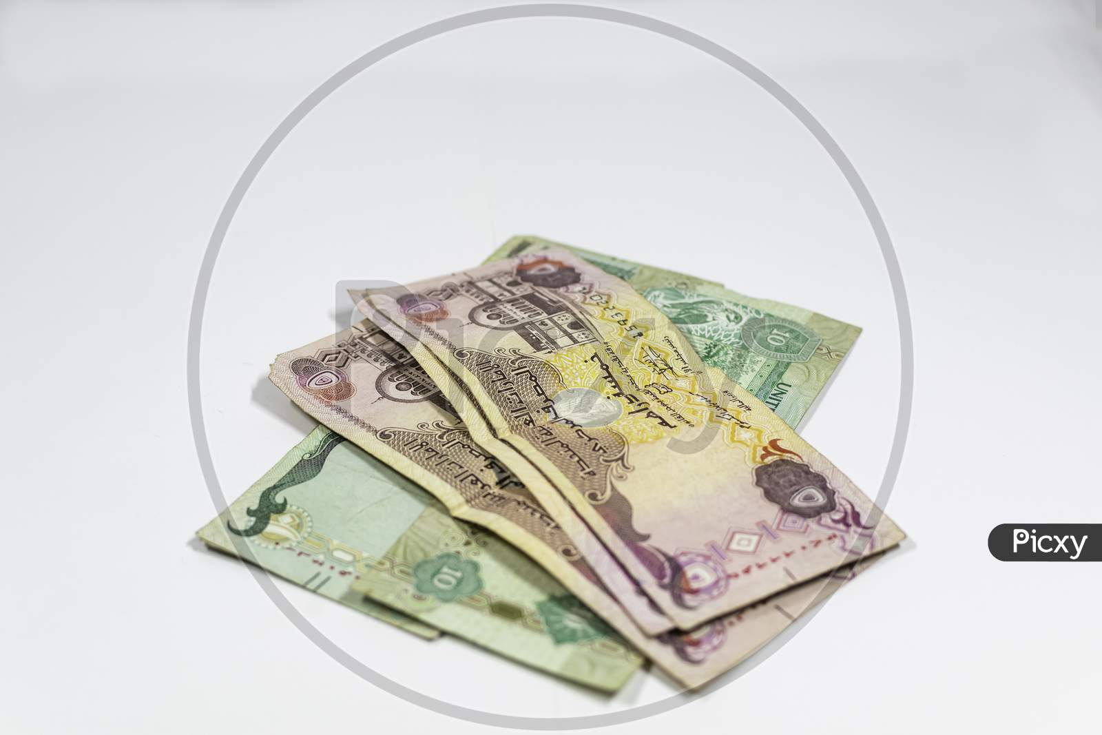10 Aed And 5 Aed United Arab Emirates Banknote With White Background. Selective Focus, Selective Focus On Subject,