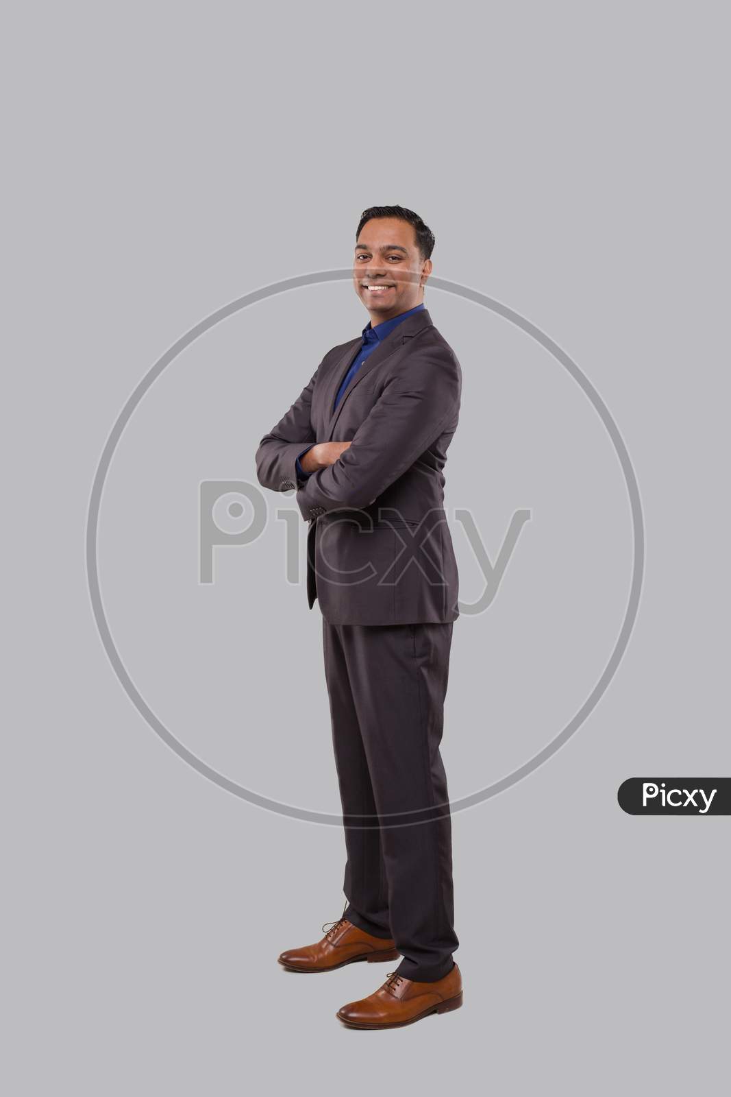 Businessman Smilling Hands Crossed Isolated. Indian Businessman Standing Full Length