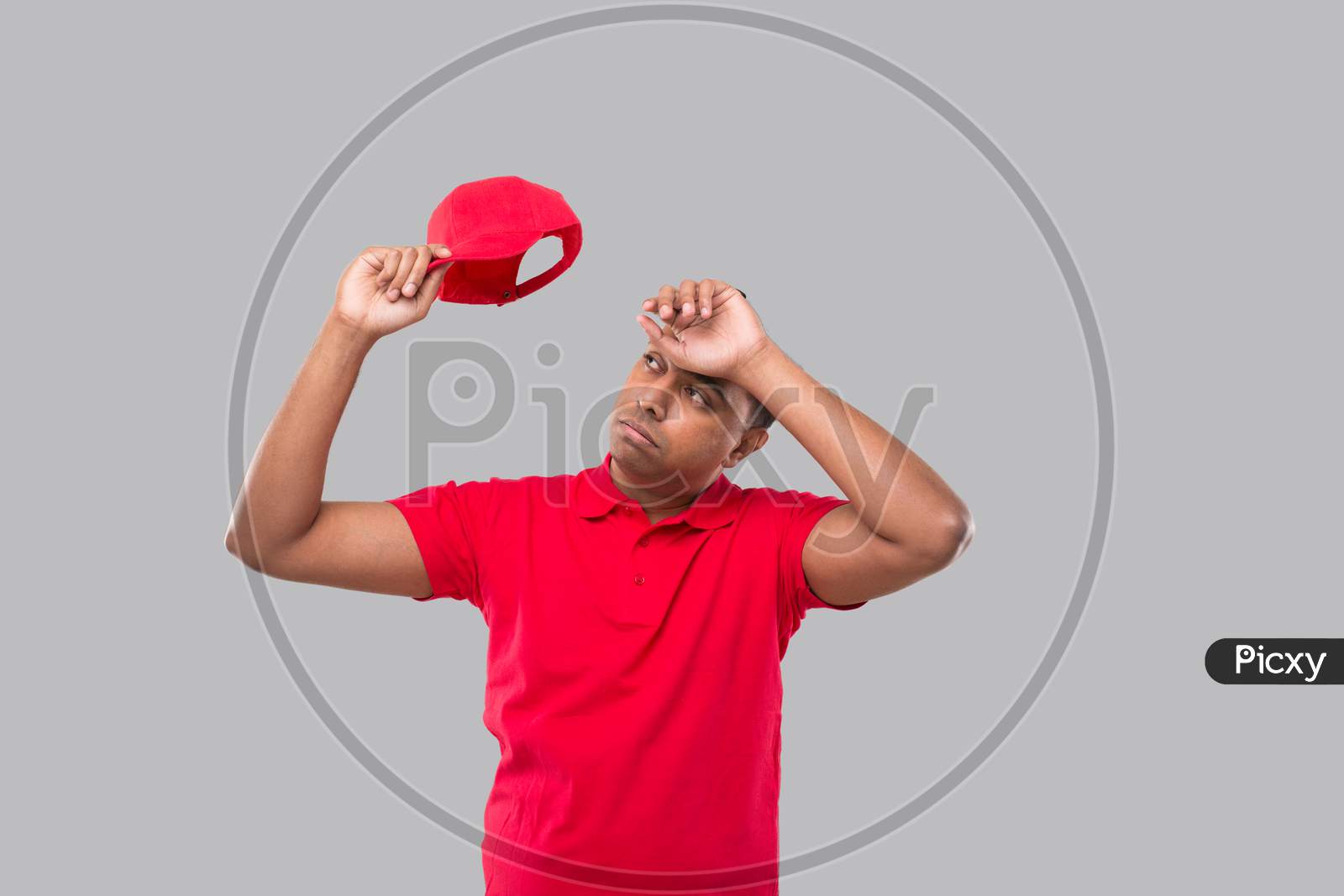 Delivery Man Tired After Work. Indian Delivery Boy Tired Sign. Red Uniform