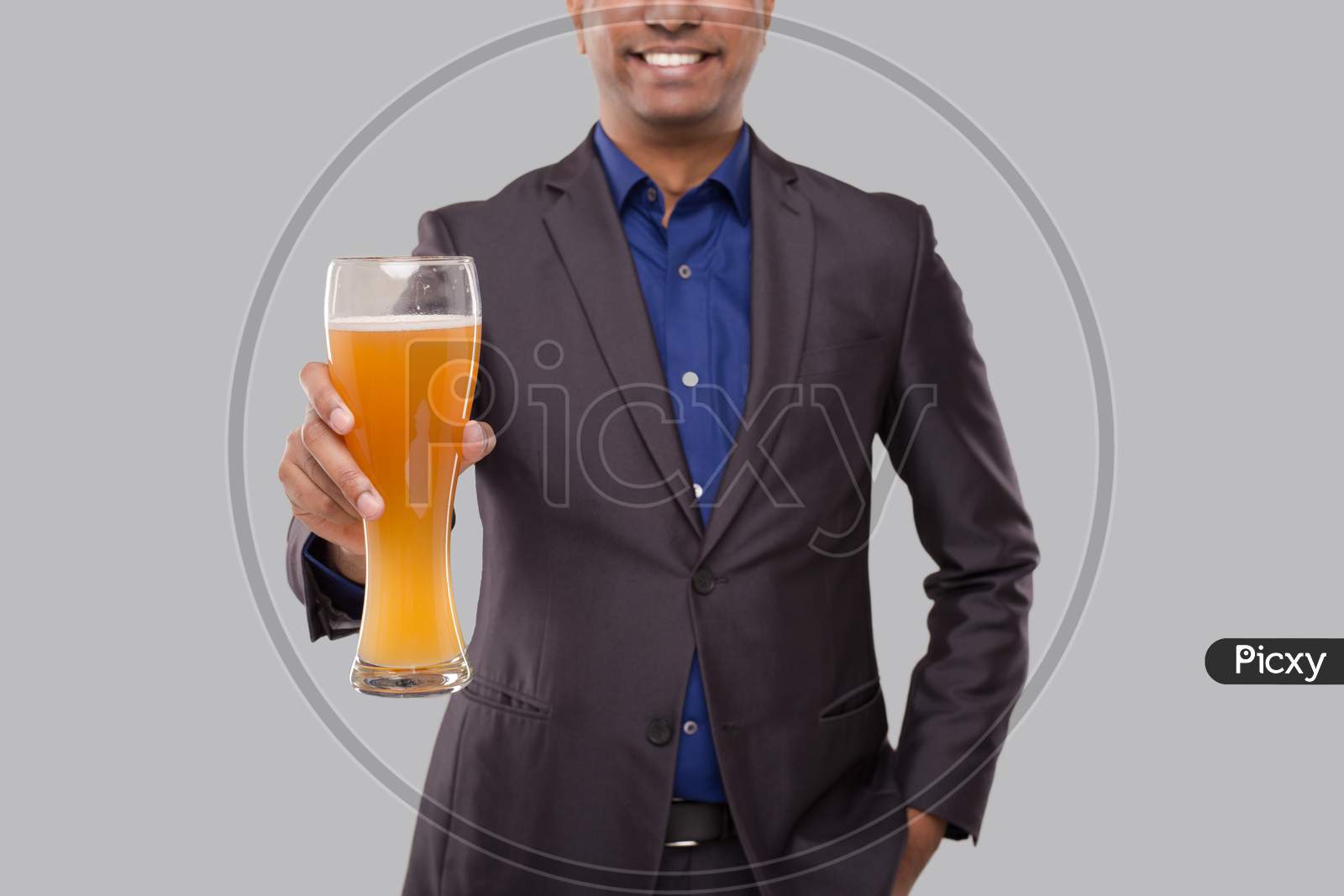 Businessman Showing Beer Glass. Indian Business Man With Beer In Hand Close Up