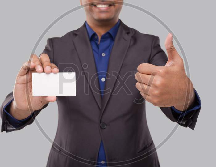 Businessman Showing Visit Card And Thumb Up Isolated Close Up. Indian Business Man Blank Card In Hand