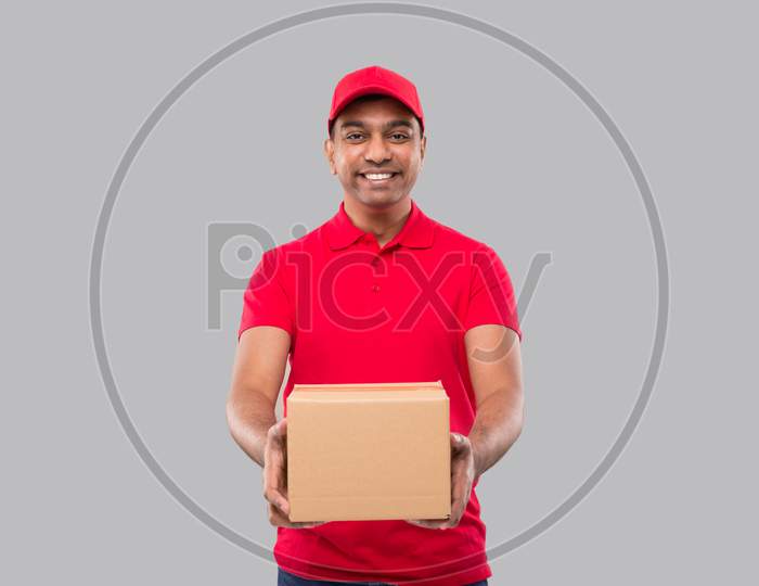 Delivery Man Box In Hands Isolated. Red Tshirt Indian Delivery Boy. Home Delivery. Quarantine Hero.