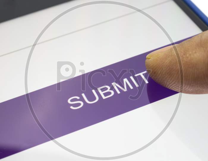 A Close View Of Submit Button On Mobile Screen With White Background