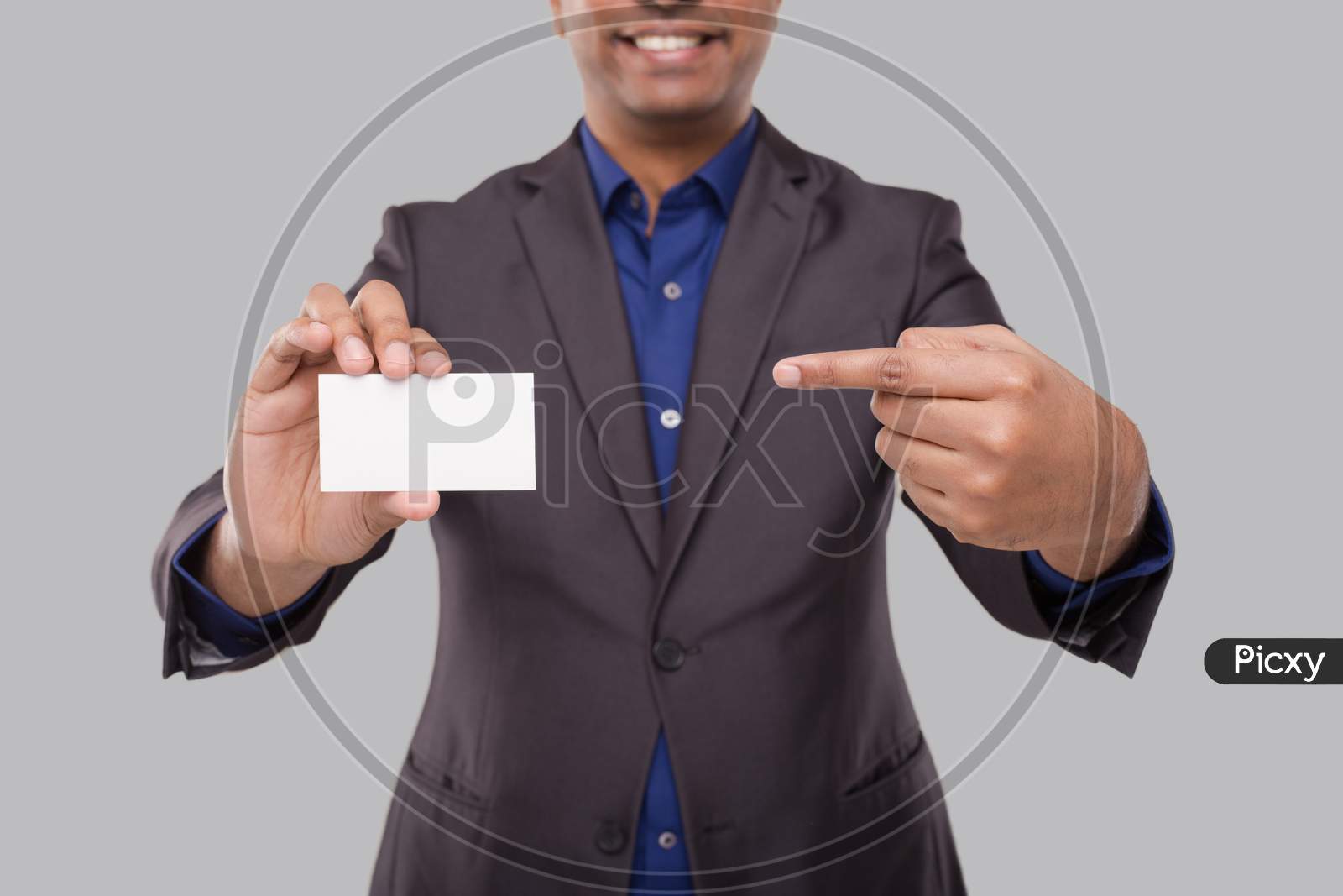 Businessman Pointing At Visit Card Isolated Close Up. Indian Business Man Blank Card In Hand