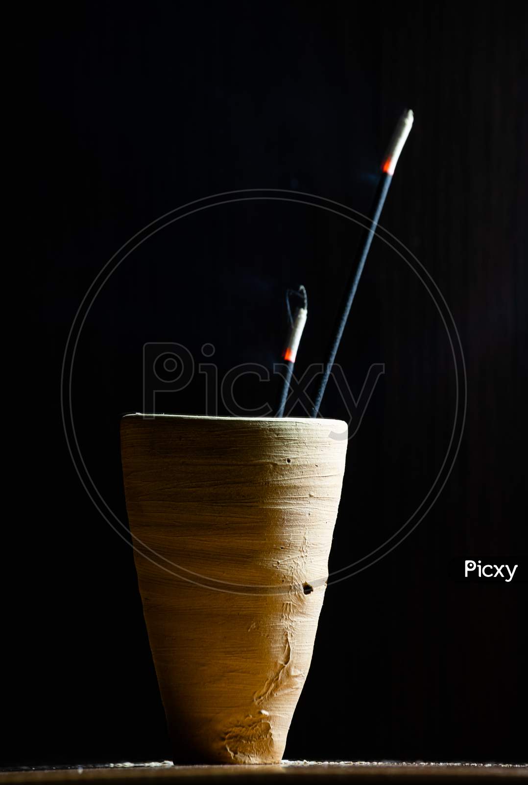 Incense Sticks Burning In A Clay Made Pot With Black Background, Agarbatti, Indian Culture, Religious Occasions,