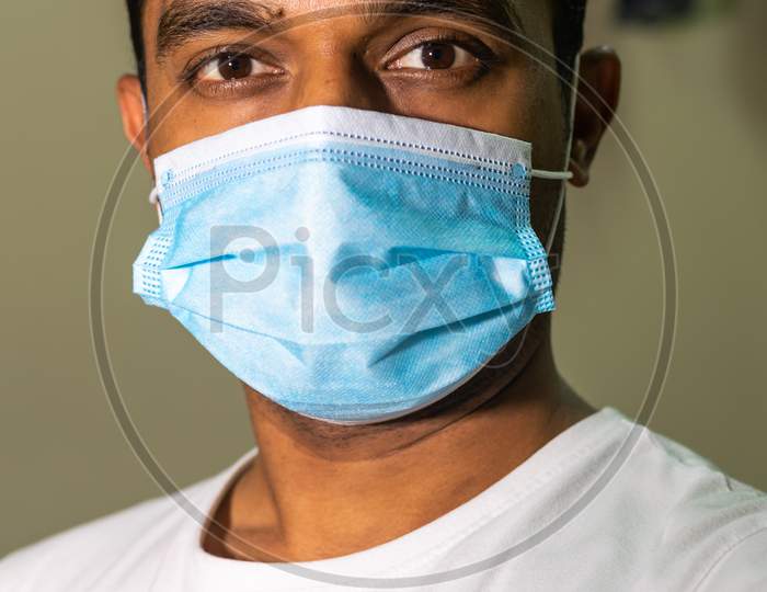 An Indian Man Portrait Wearing A Medical Mask